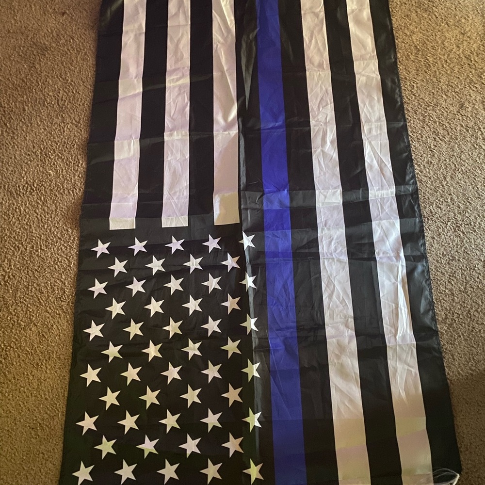 Black and White Flag with Blue Stripe and Stars